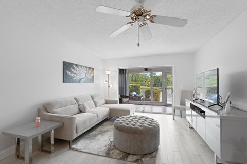 Photo of 8753 Bella Vista Drive #33, Boca Raton, FL 33433 (MLS # RX-11087939)