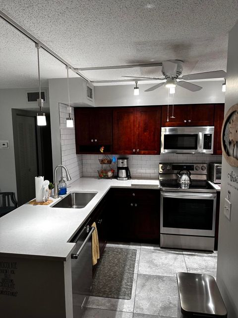 Photo of 14895 Builtmore Way #107, Delray Beach, FL 33446 (MLS # RX-11129051)