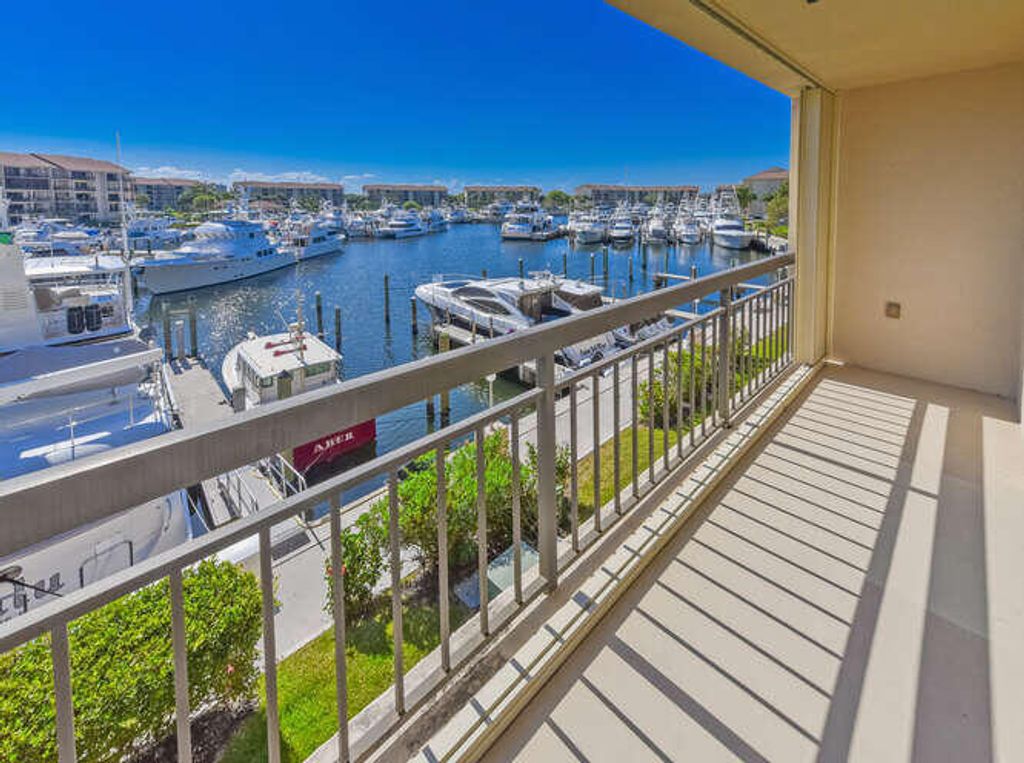 Photo of 2601 Marina Isle Way Way #303, Jupiter, FL 33477 (MLS # RX-11113313)