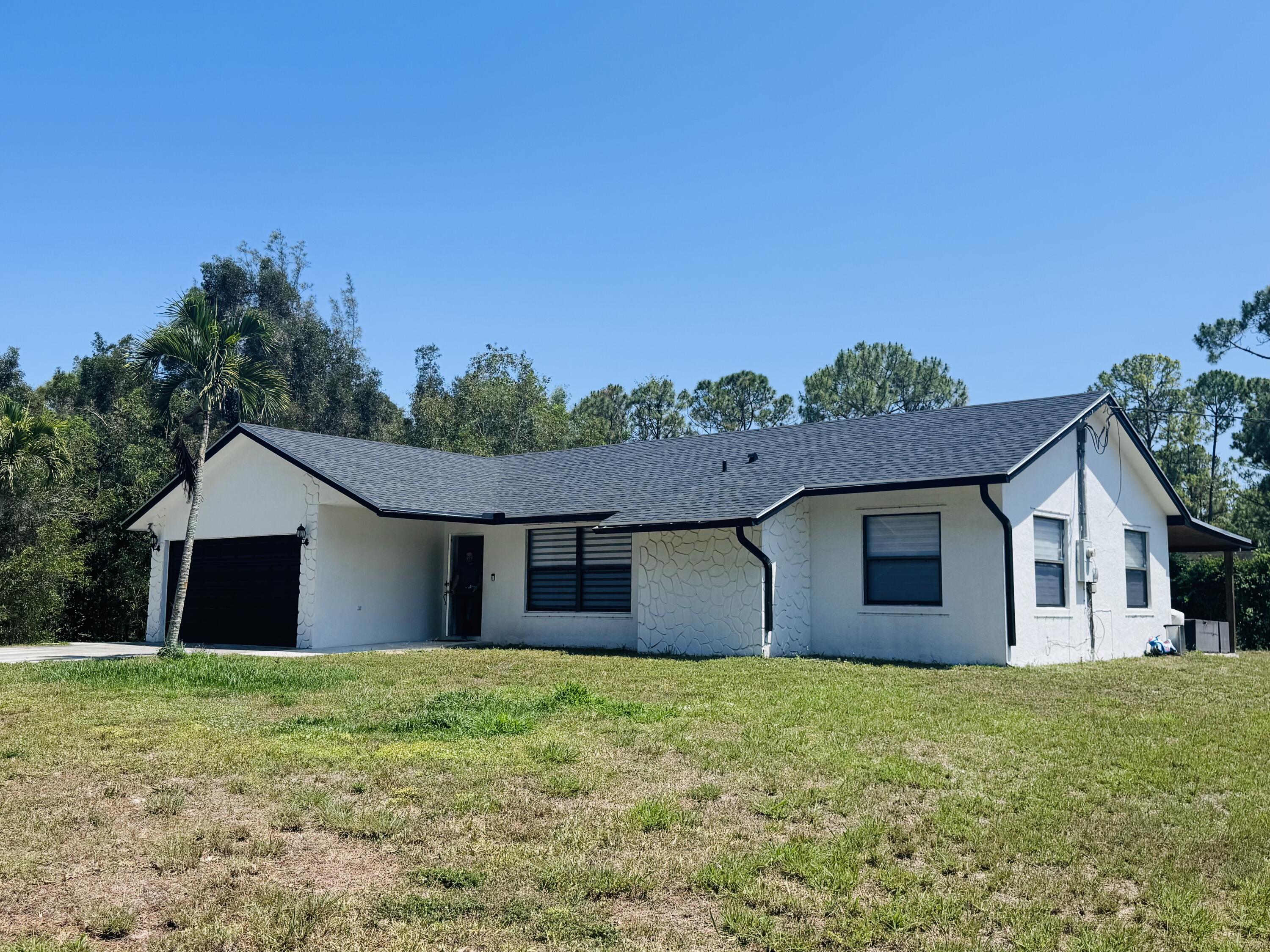 Property for Sale at 14196 N 77th Place, Loxahatchee, Palm Beach County, Florida - Bedrooms: 3 
Bathrooms: 2  - $629,000