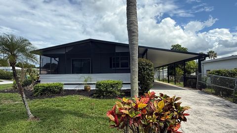 Photo of 7056 SE Amendment Street, Hobe Sound, FL 33455 (MLS # RX-11107383)