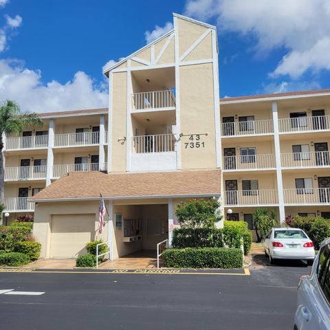 Photo of 7351 Kinghurst Drive #404, Delray Beach, FL 33446 (MLS # RX-11129107)
