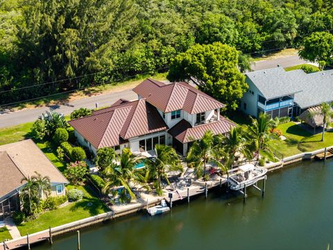 Photo of 9335 SE Delafield Street, Hobe Sound, FL 33455 (MLS # RX-11111579)