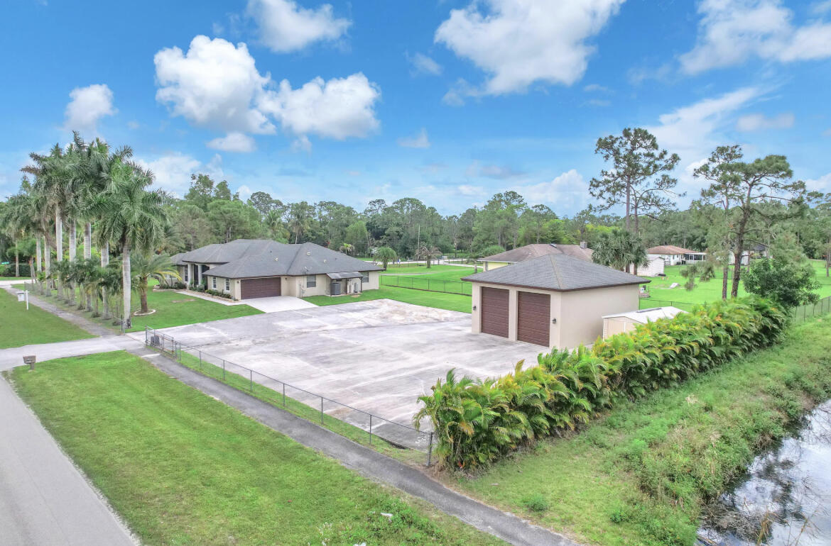 Property for Sale at 12174 Persimmon Boulevard, The Acreage, Palm Beach County, Florida - Bedrooms: 4 
Bathrooms: 2.5  - $834,999