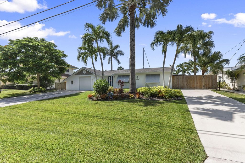 Photo of 1769 SW Dyer Point Road, Palm City, FL 34990 (MLS # RX-11111599)