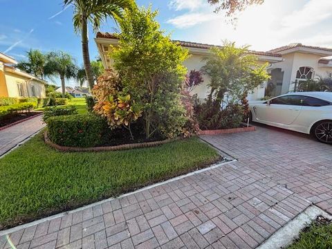 Photo of 9797 Galleon Drive, West Palm Beach, FL 33411 (MLS # RX-11126179)