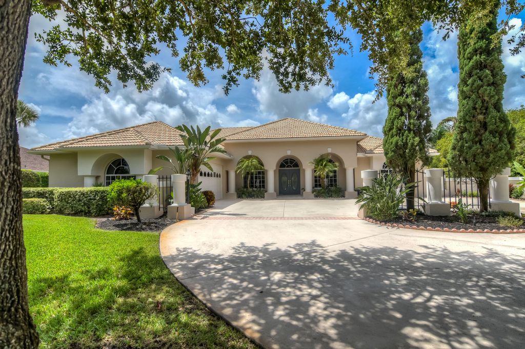 Photo of 2628 SW River Shore Drive, Port Saint Lucie, FL 34984 (MLS # RX-10851733)