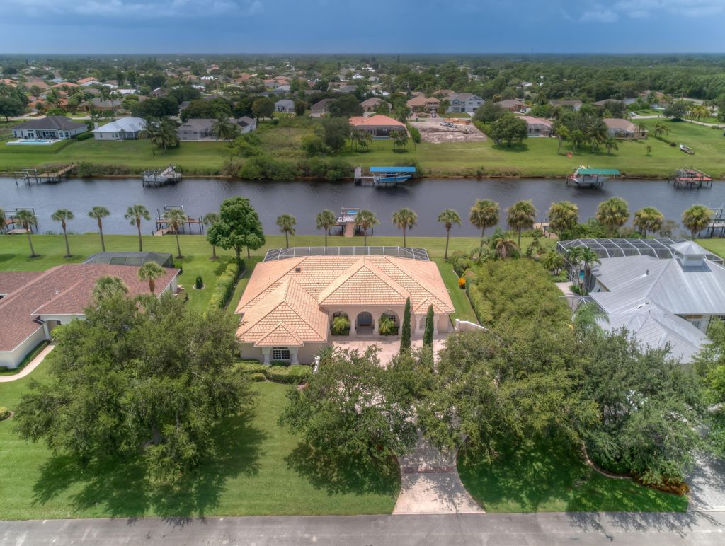 Photo of 2628 SW River Shore Drive, Port Saint Lucie, FL 34984 (MLS # RX-10851733)