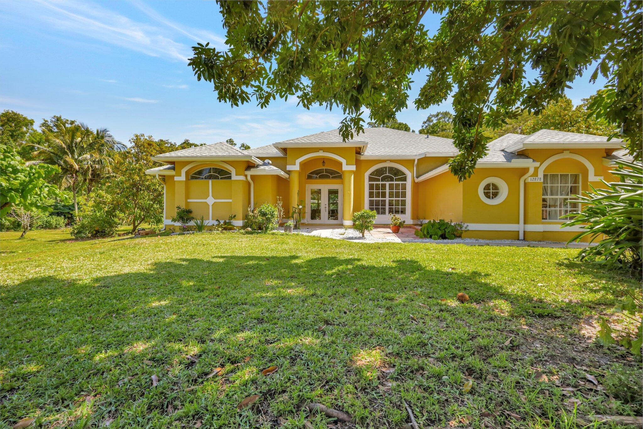 Property for Sale at 12878 77th Place, The Acreage, Palm Beach County, Florida - Bedrooms: 3 
Bathrooms: 2  - $790,000