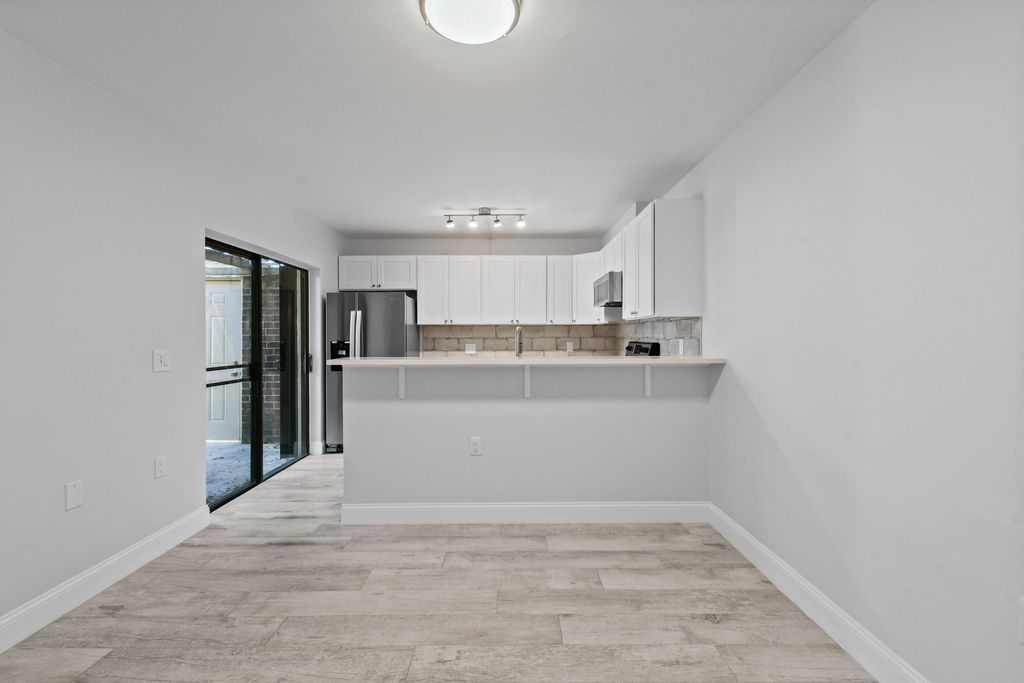 Photo of 1405 14th Terrace, Palm Beach Gardens, FL 33418 (MLS # RX-11048520)