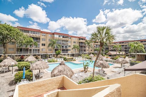 Photo of 404 NW 68th Avenue #407, Plantation, FL 33317 (MLS # RX-11110831)