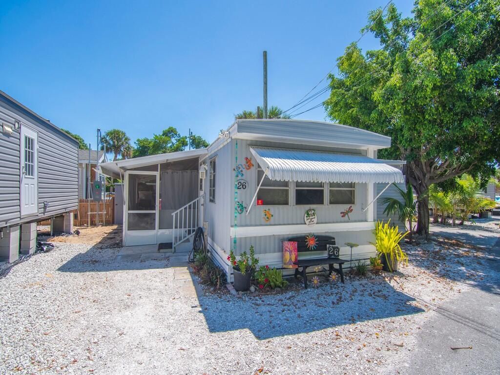 Photo of 2423 NE Palm Avenue #26, Jensen Beach, FL 34957 (MLS # RX-11116621)