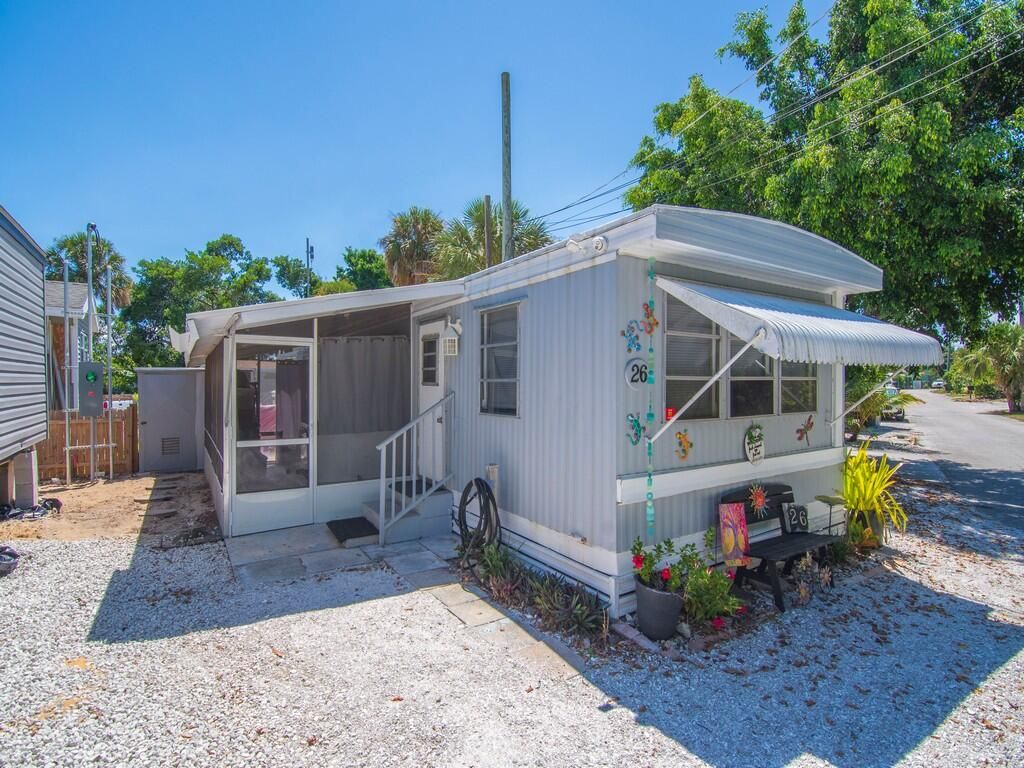 Photo of 2423 NE Palm Avenue #26, Jensen Beach, FL 34957 (MLS # RX-11116621)