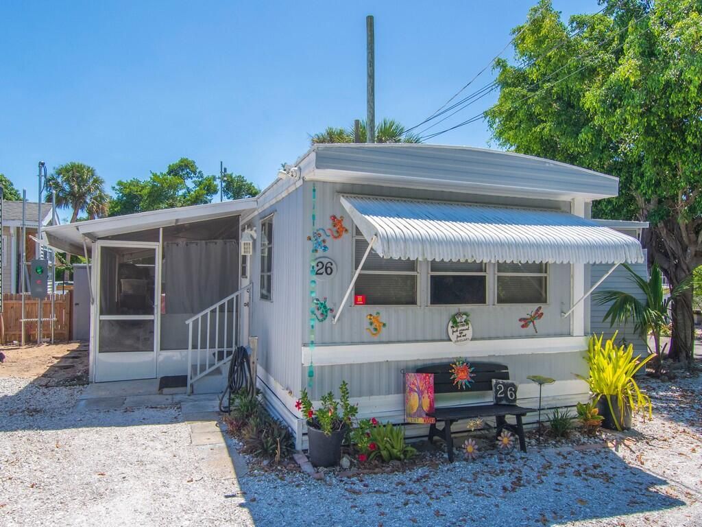 Photo of 2423 NE Palm Avenue #26, Jensen Beach, FL 34957 (MLS # RX-11116621)