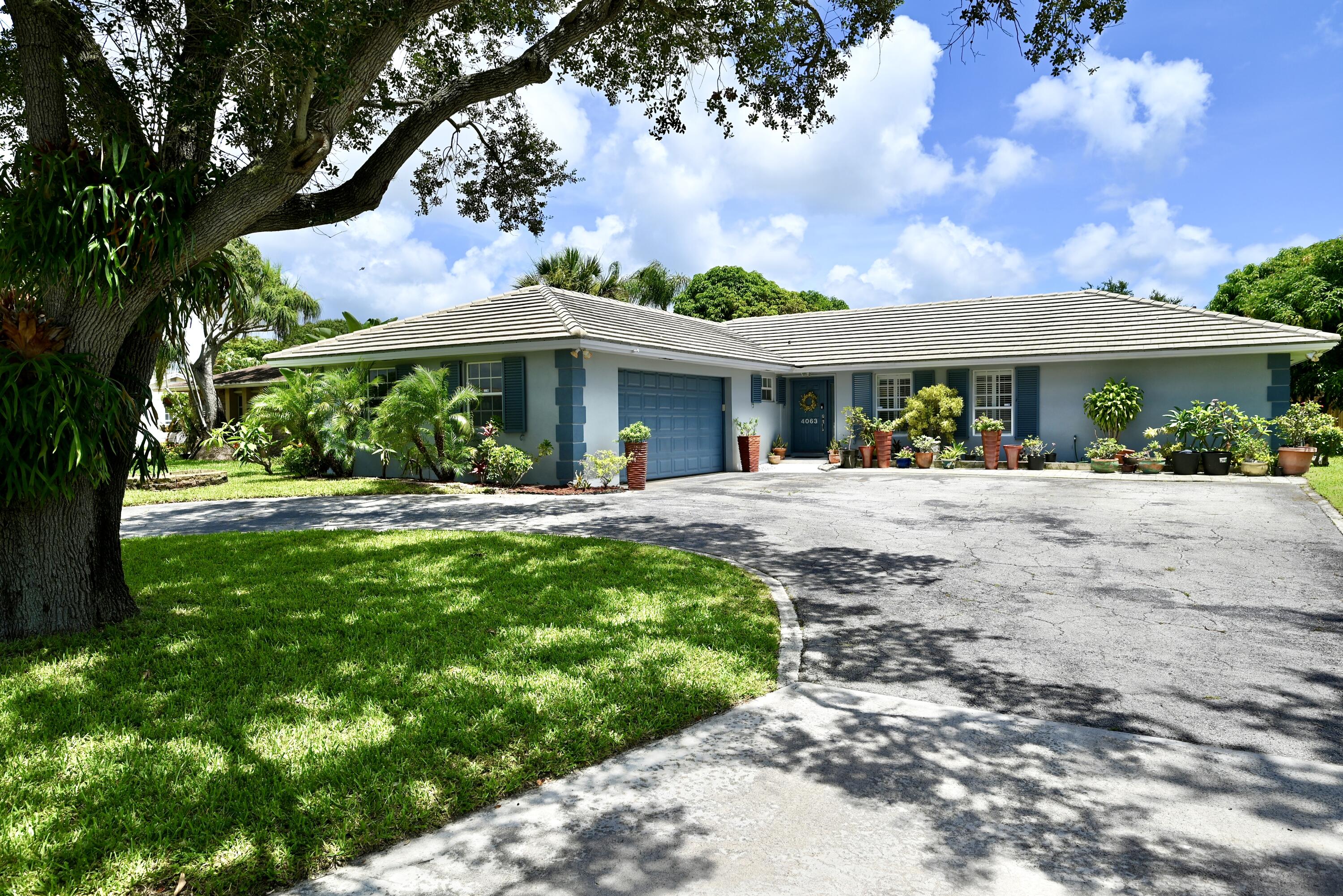 4063 N Jonquil Circle, Palm Beach Gardens, Palm Beach County, Florida - 5 Bedrooms  
2 Bathrooms - 