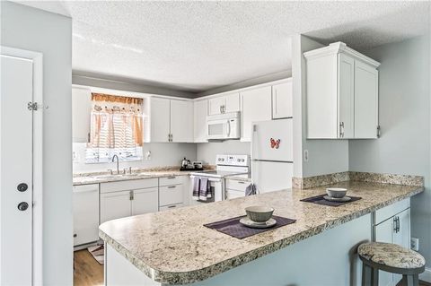 Photo of 1310 NE 14th Court #K19, Jensen Beach, FL 34957 (MLS # RX-11126529)