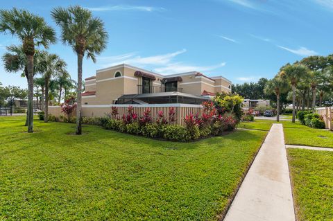 Photo of 3715 Village Drive #D, Delray Beach, FL 33445 (MLS # RX-11129417)