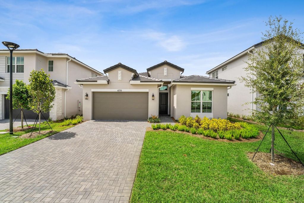 Photo of 6770 SE Lost Pine Drive #24, Stuart, FL 34997 (MLS # RX-11114704)