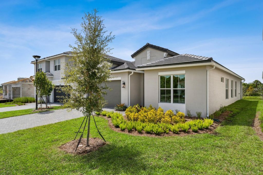 Photo of 6770 SE Lost Pine Drive #24, Stuart, FL 34997 (MLS # RX-11114704)