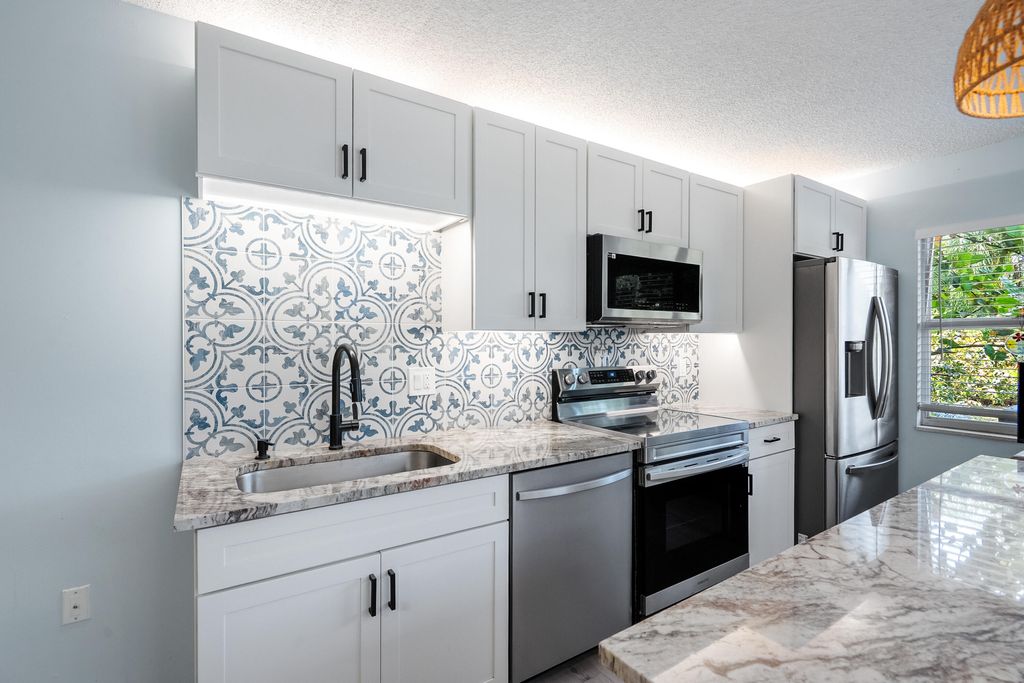 Photo of 3273 SW Sunset Trace Circle, Palm City, FL 34990 (MLS # RX-11084859)