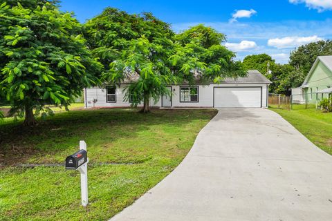 Photo of 1575 SW Fresno Road, Port Saint Lucie, FL 34953 (MLS # RX-11129610)