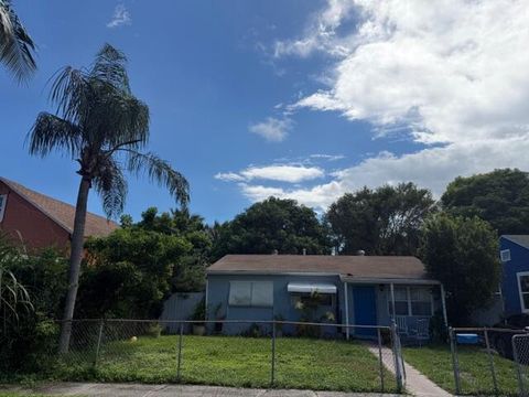 Photo of 628 49th Street, West Palm Beach, FL 33407 (MLS # RX-11126955)