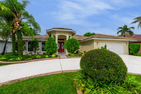 Photo of 221 Cypress Trace, Royal Palm Beach, FL 33411 (MLS # RX-11125582)