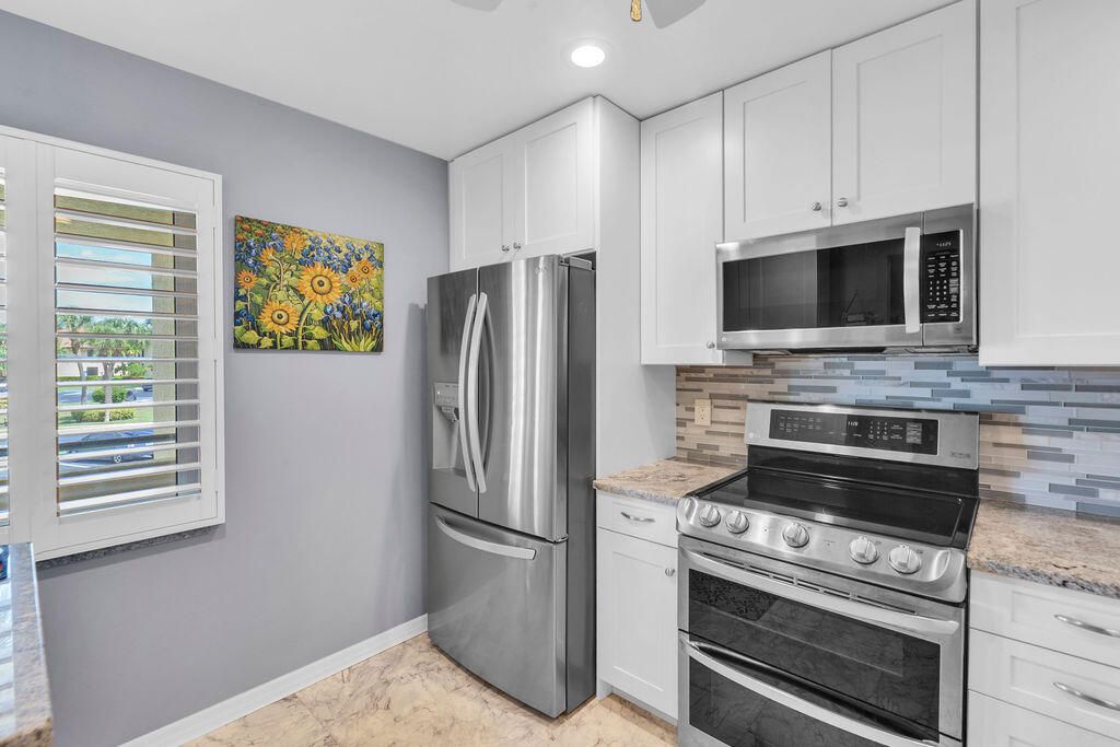 Photo of 6980 SE Constitution Boulevard #203, Hobe Sound, FL 33455 (MLS # RX-11119716)