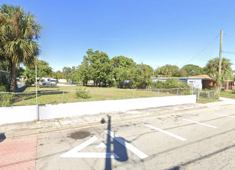 Photo of 1440 W 28th Street, Riviera Beach, FL 33404 (MLS # RX-11129034)