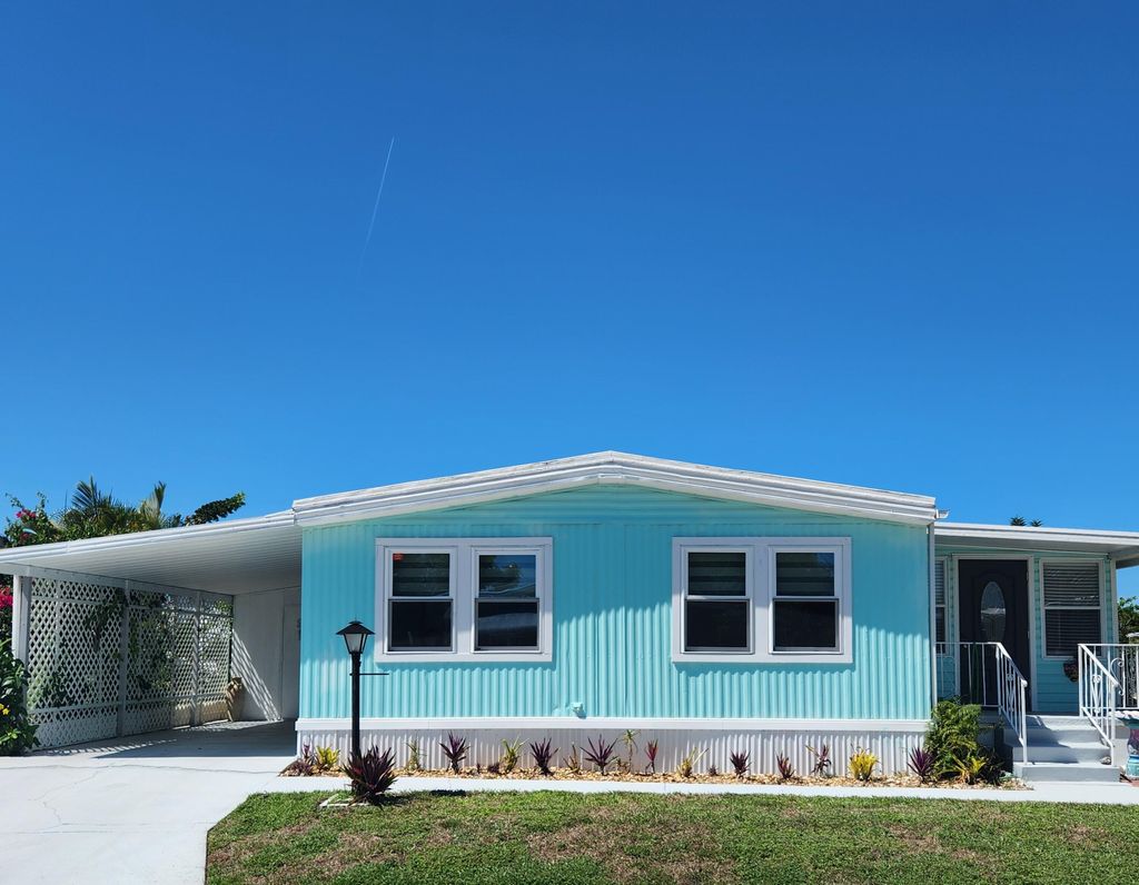 Photo of 162 S Warner Drive, Jensen Beach, FL 34957 (MLS # RX-11116238)