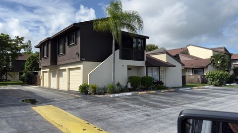 Photo of 5340 Bosque 98 Lane #98, West Palm Beach, FL 33415 (MLS # RX-11127663)