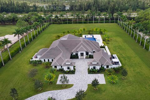 Photo of 14699 Black Bear Road, Palm Beach Gardens, FL 33418 (MLS # RX-11129131)