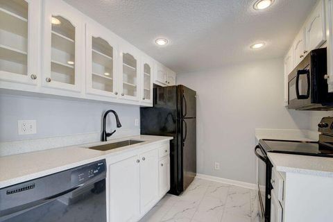 Photo of 612 Executive Center Drive #103, West Palm Beach, FL 33401 (MLS # RX-11126457)