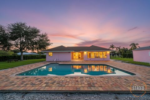 Photo of 1795 SE Adair Road, Port Saint Lucie, FL 34952 (MLS # RX-11127644)