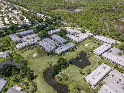 Photo of 18081 SE Country Club Drive #3-26, Jupiter, FL 33469 (MLS # RX-11122930)