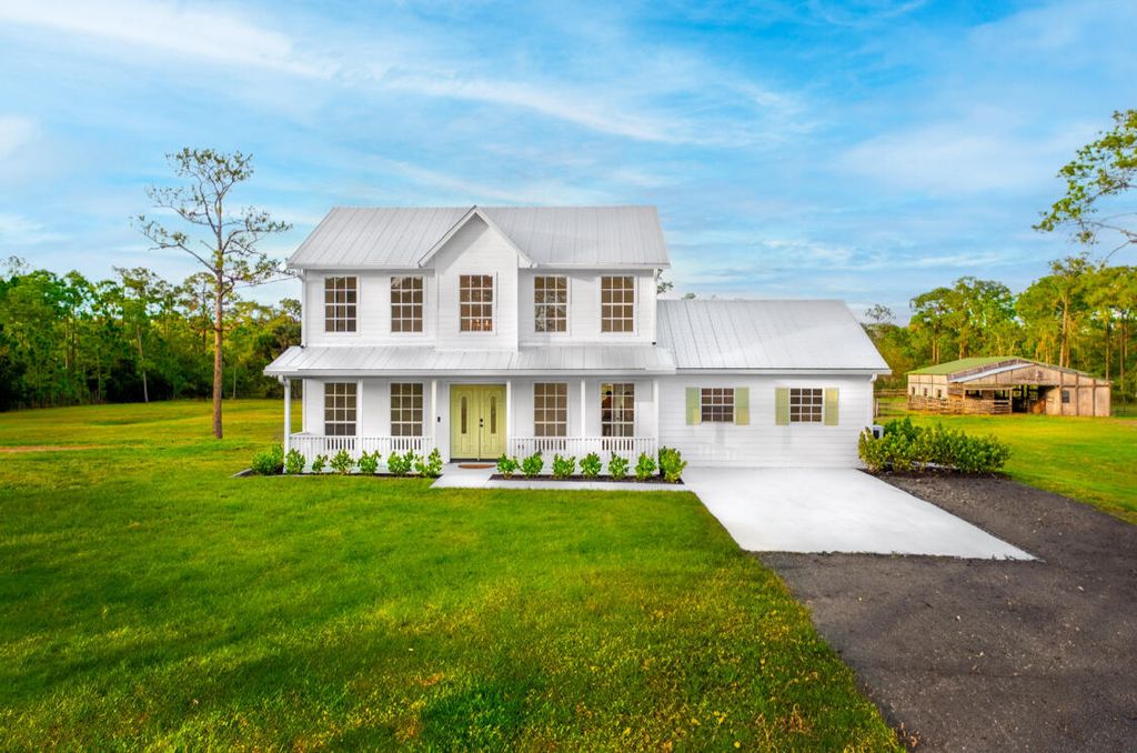 Photo of 5907 SW Cherokee Street, Palm City, FL 34990 (MLS # RX-10952255)