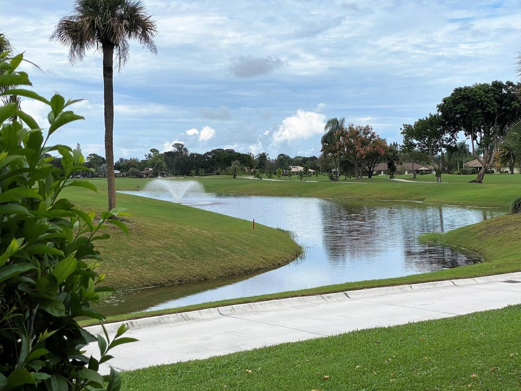 Photo of 13369 Touchstone Place #102, Palm Beach Gardens, FL 33418 (MLS # RX-10754719)