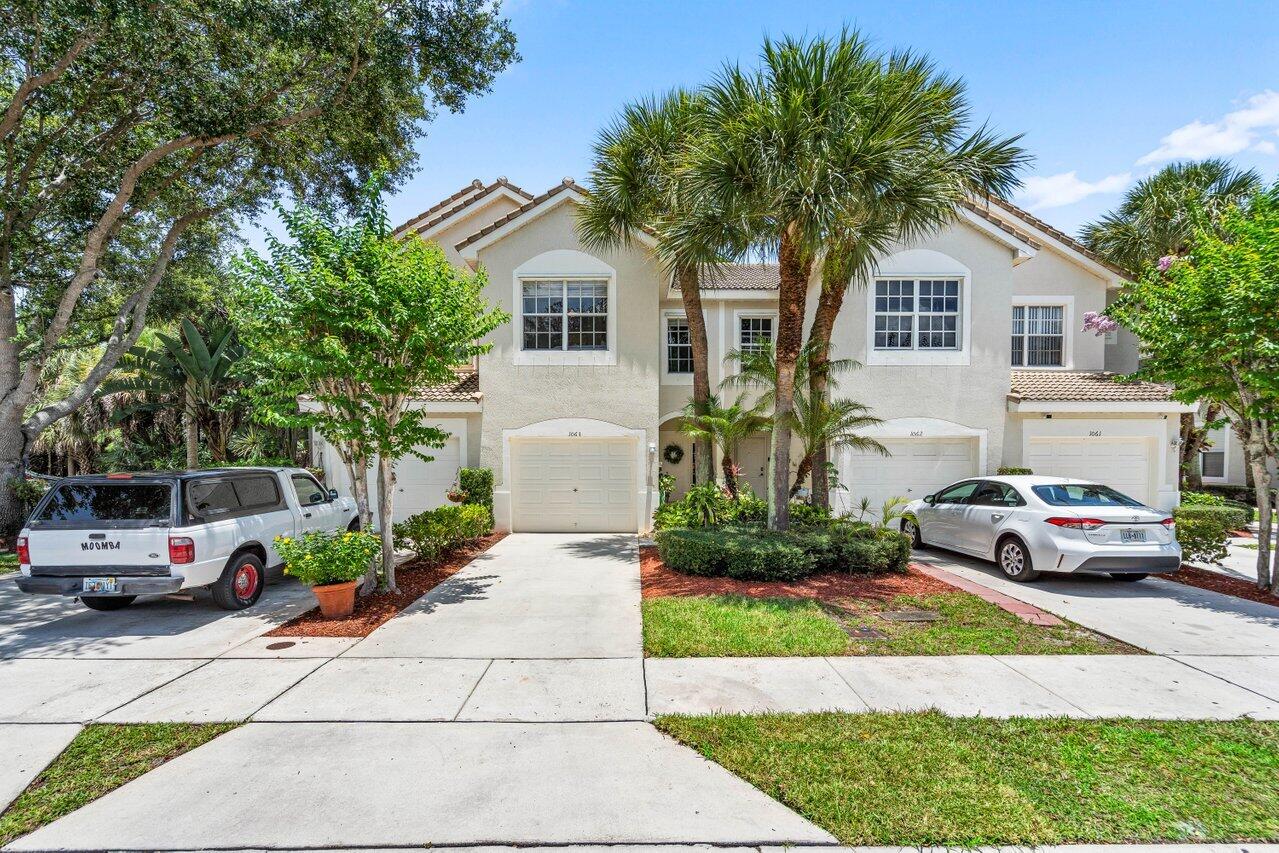 1063 Woodfield Road, Greenacres, Palm Beach County, Florida - 3 Bedrooms  
2.5 Bathrooms - 