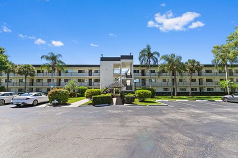 Photo of 15244 Lakes Of Delray Boulevard #203, Delray Beach, FL 33484 (MLS # RX-11128622)