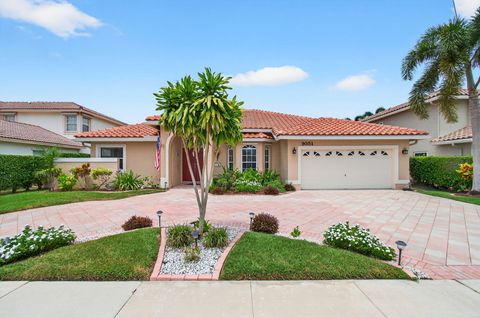 Photo of 9351 Aqua Vista Boulevard, Boynton Beach, FL 33437 (MLS # RX-11110420)