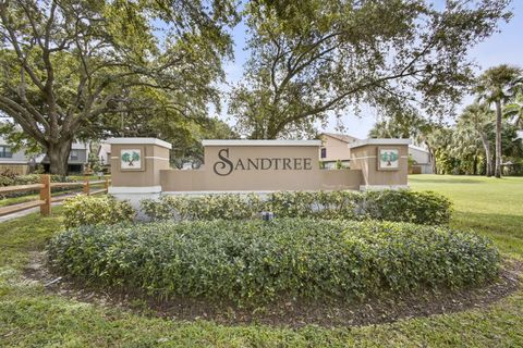 Photo of 323 Sandtree Drive, Palm Beach Gardens, FL 33403 (MLS # RX-11129153)