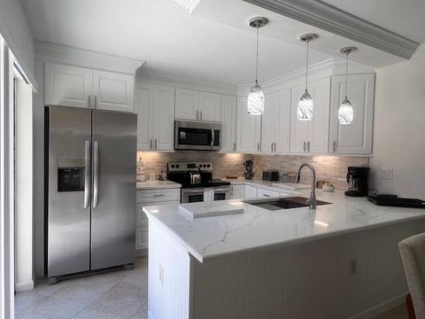 Photo of 3063 30th Court, Jupiter, FL 33477 (MLS # RX-11114538)