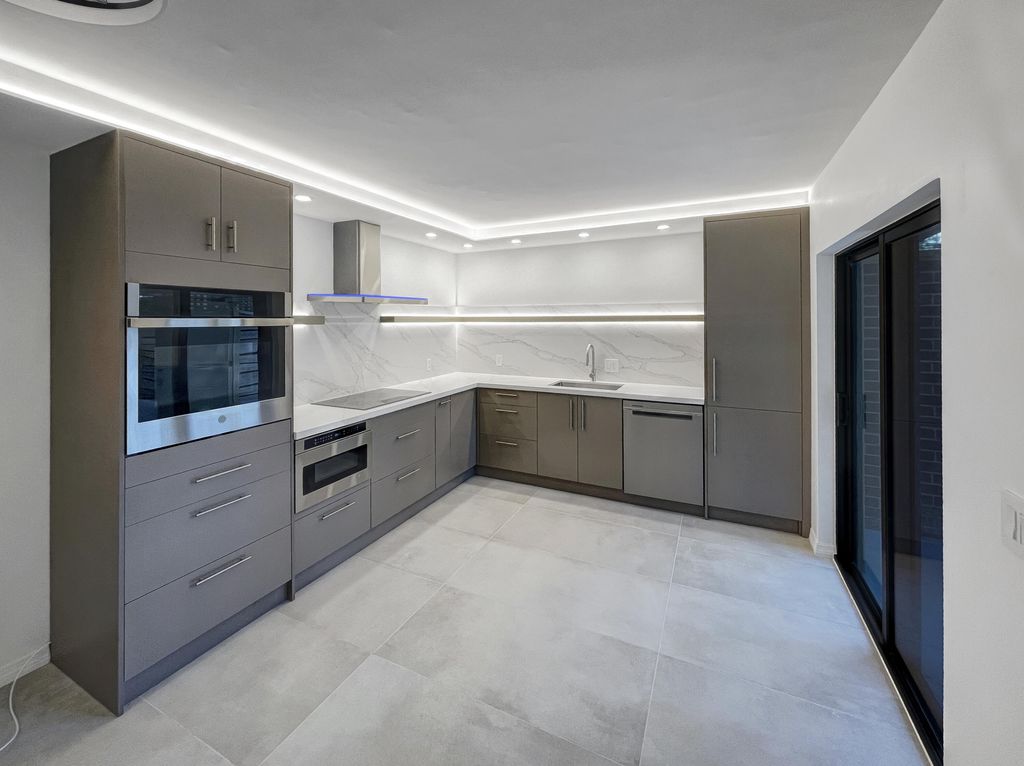 Photo of 1315 13th Terrace, Palm Beach Gardens, FL 33418 (MLS # RX-11096662)