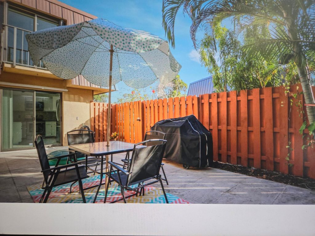 Photo of 5633 SE Windsong Lane SE, Stuart, FL 34997 (MLS # RX-11058568)