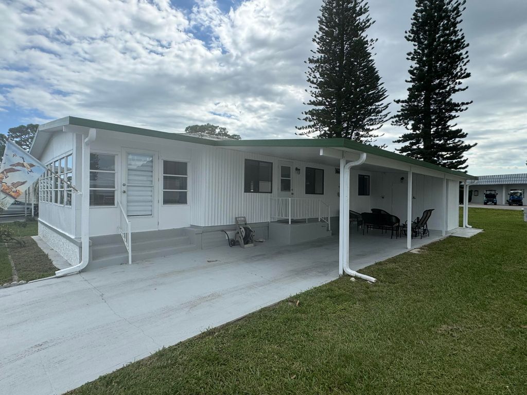 Photo of 322 S Erie Dr Dr, Fort Pierce, FL 34946 (MLS # RX-11075747)