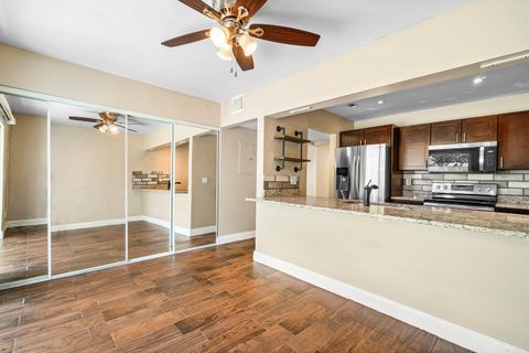 Photo of 5090 Elmhurst Road #E, West Palm Beach, FL 33417 (MLS # RX-11125561)