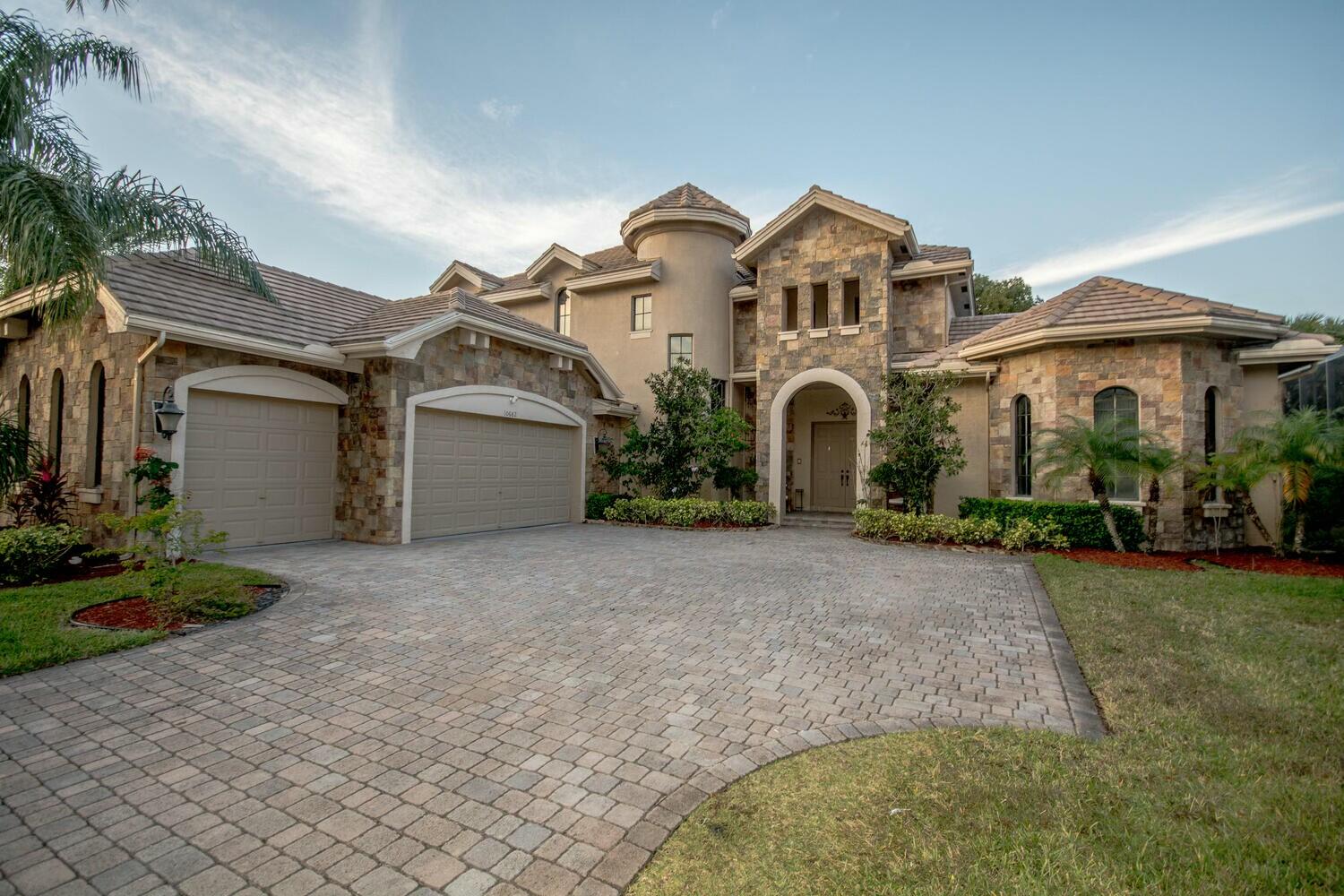 Property for Sale at 10682 Versailles Boulevard, Wellington, Palm Beach County, Florida - Bedrooms: 5 
Bathrooms: 4.5  - $1,399,000