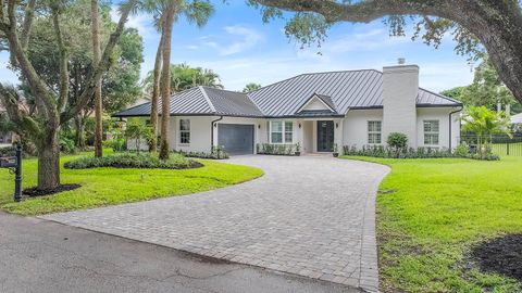 Photo of 18433 SE Heritage Drive, Tequesta, FL 33469 (MLS # RX-11123967)