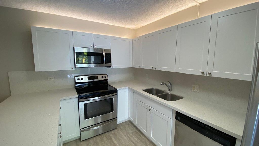 Photo of 1522 15th Terrace, Palm Beach Gardens, FL 33418 (MLS # RX-11120526)