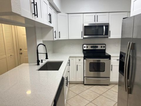 Photo of 6394 Emerald Dunes Drive W #204, West Palm Beach, FL 33411 (MLS # RX-11126455)